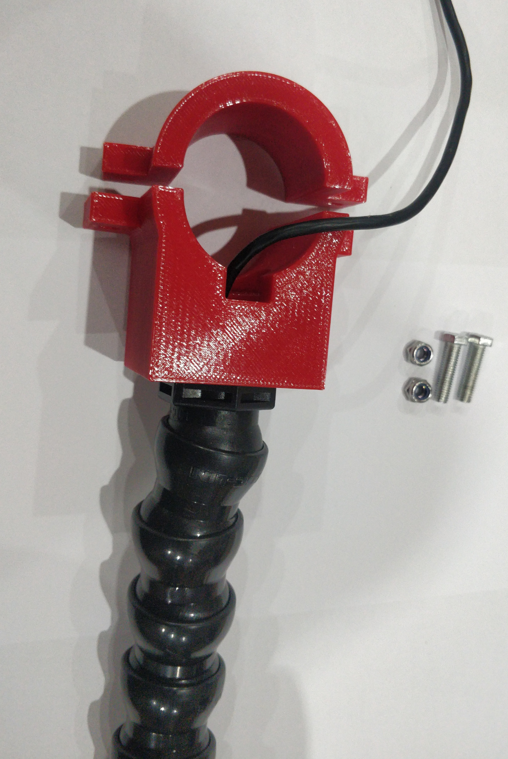 The hose gets connected via a threaded hole